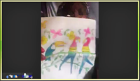 A participant uses video to share an a drawing of birds to the group that she received as a gift from a past patient and discuss how that patient enjoyed art.